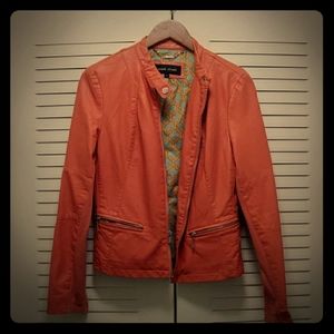 Black rivet orange Faux leather jacket
